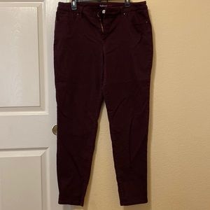 Woman burgandy jeans